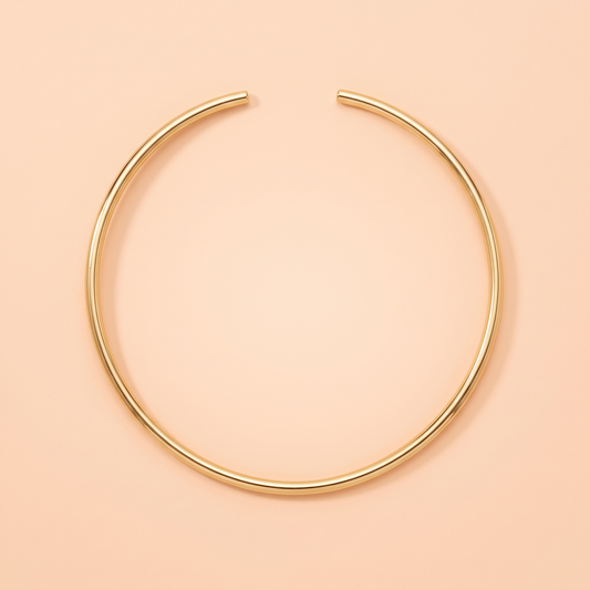 Luna Choker Gold flat lay on peach