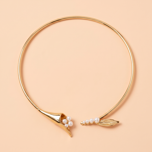 Calla Choker Gold flat lay on peach