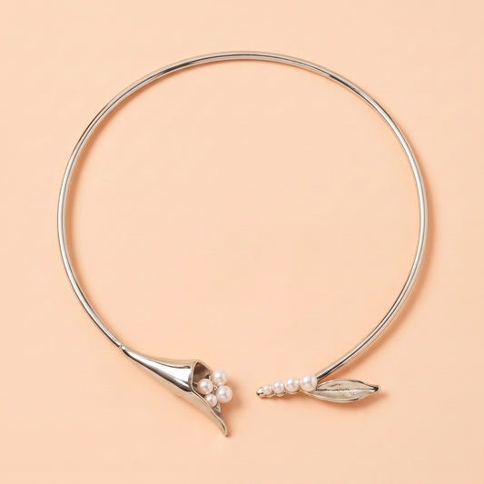 Calla Choker Silver flat lay on peach