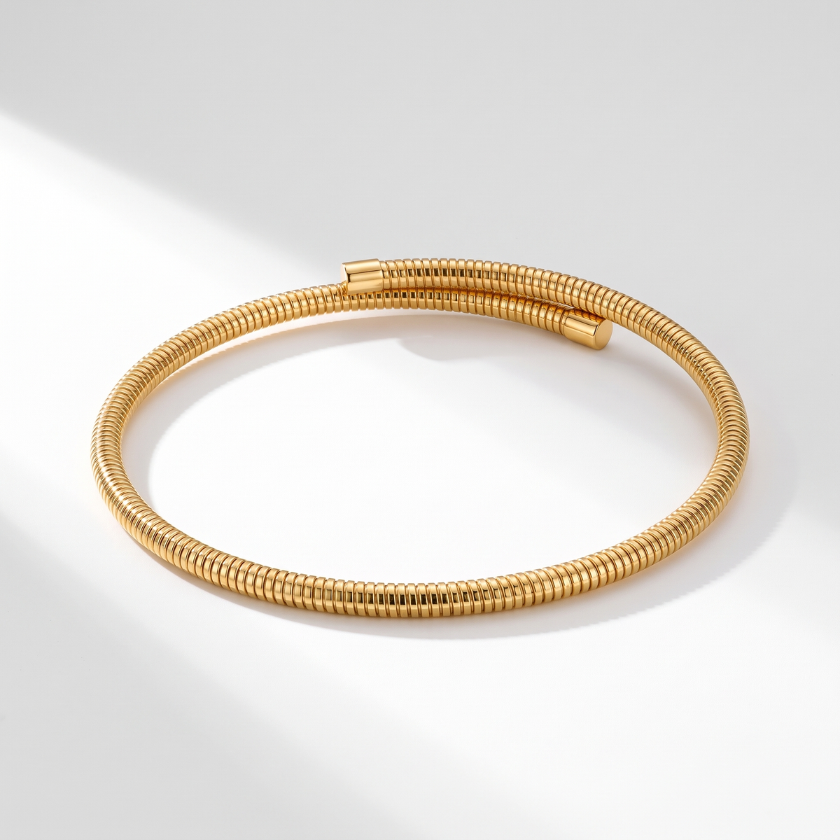 Spira Choker Gold on white with soft light
