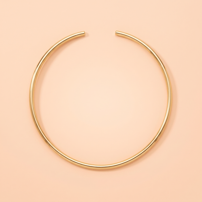 Luna Choker Gold flat lay on peach