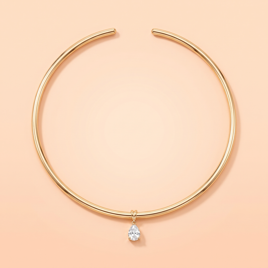 Goccia Choker Gold flat lay on peach