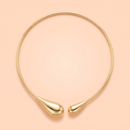 Bacio Choker Gold flat lay on peach