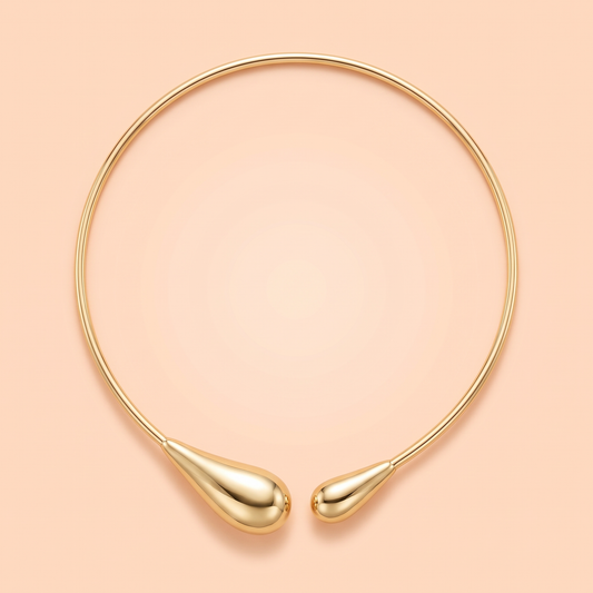 Bacio Choker Gold flat lay on peach