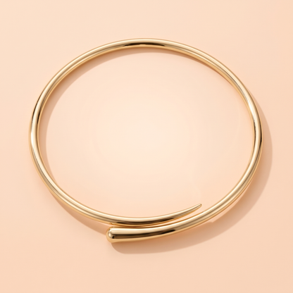 Volta Choker Gold flat lay on peach