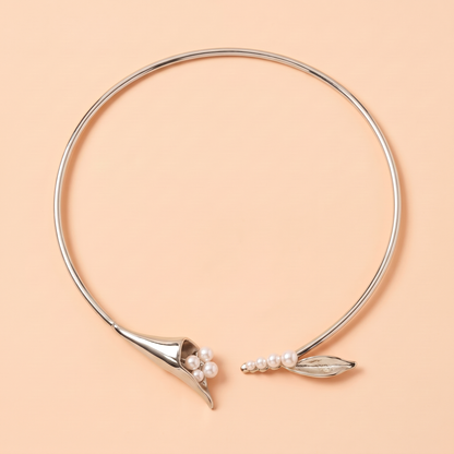 Calla Choker Silver flat lay on peach