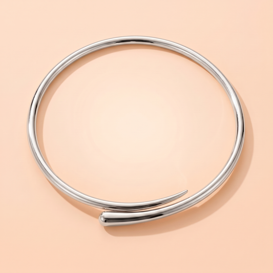 Volta Choker Silver flat lay on peach